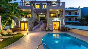 Seasonal outdoor pool, pool umbrellas, pool loungers