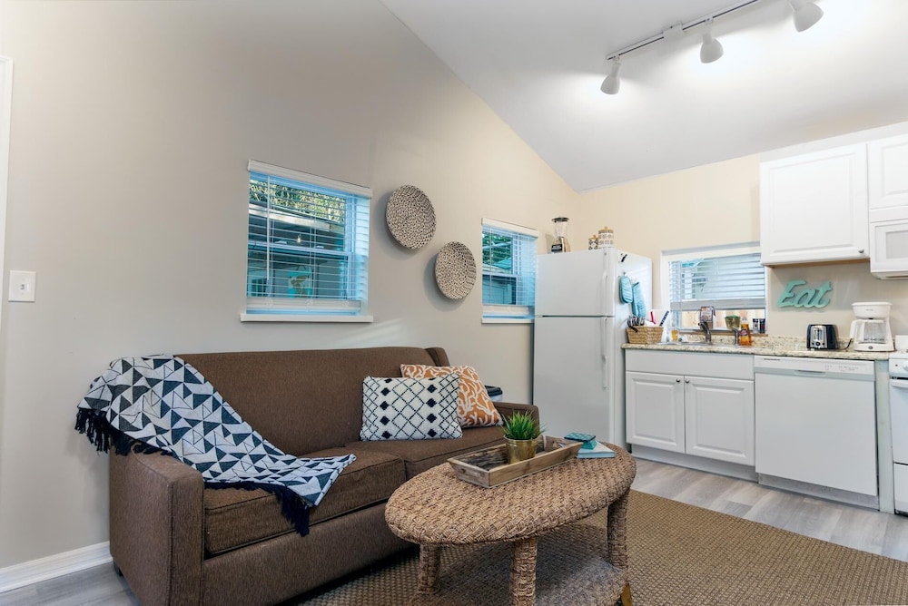 Welcome to the beach life! Enjoy this cozy cottage with two full baths, and two full bedrooms