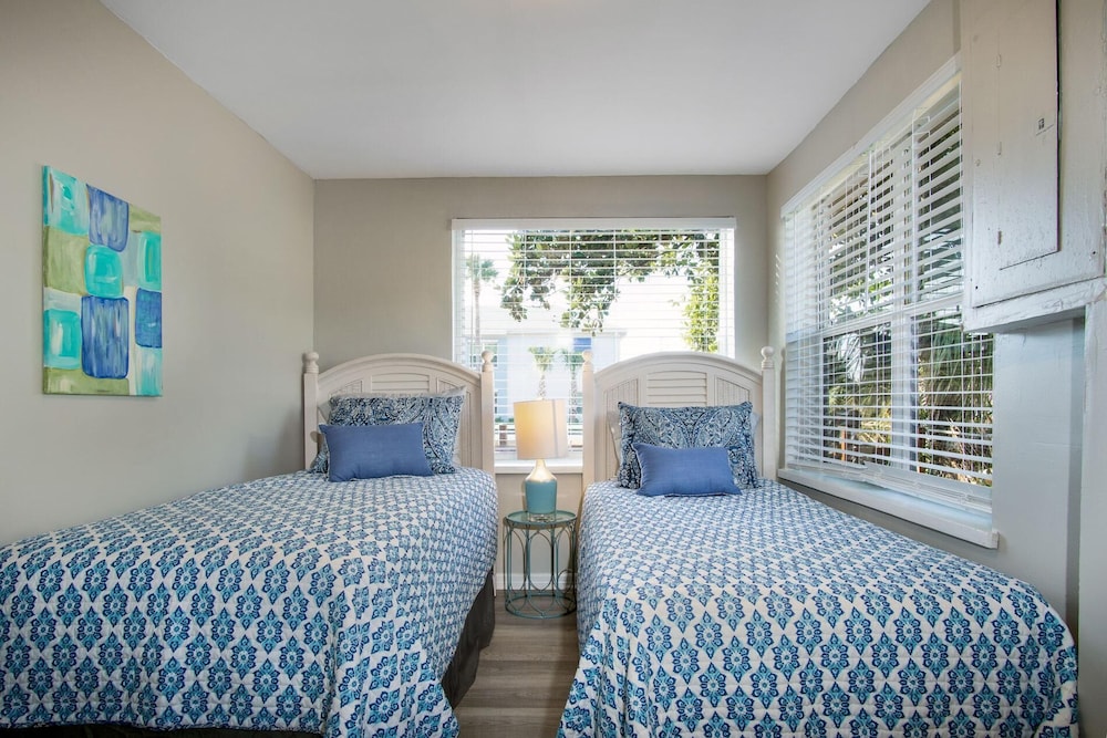 Welcome to the beach life! Enjoy this cozy cottage with two full baths, and two full bedrooms