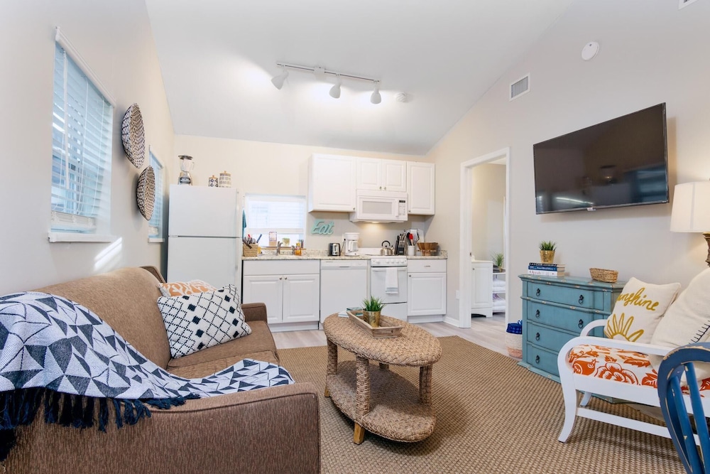 Welcome to the beach life! Enjoy this cozy cottage with two full baths, and two full bedrooms