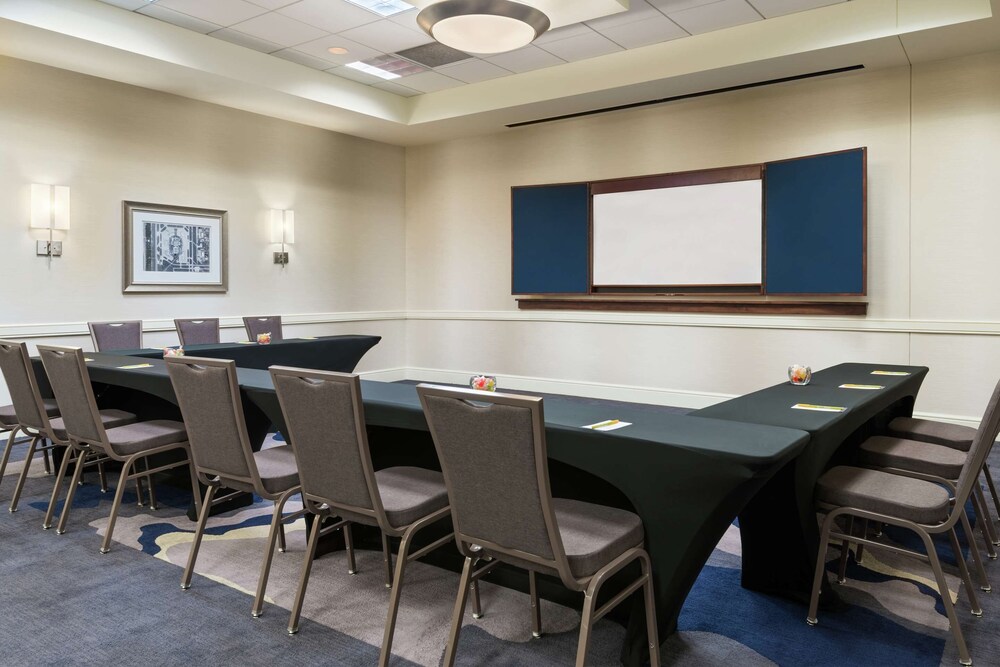 2 Connecting Suites with 3 beds and 1 sofabed at a Full Service Hotel by Suiteness