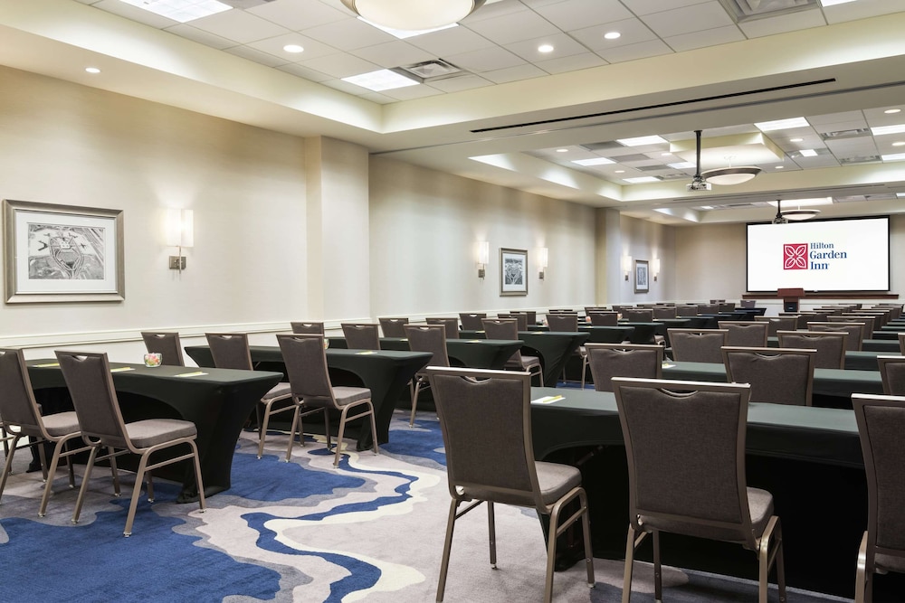 2 Connecting Suites with 3 beds and 1 sofabed at a Full Service Hotel by Suiteness