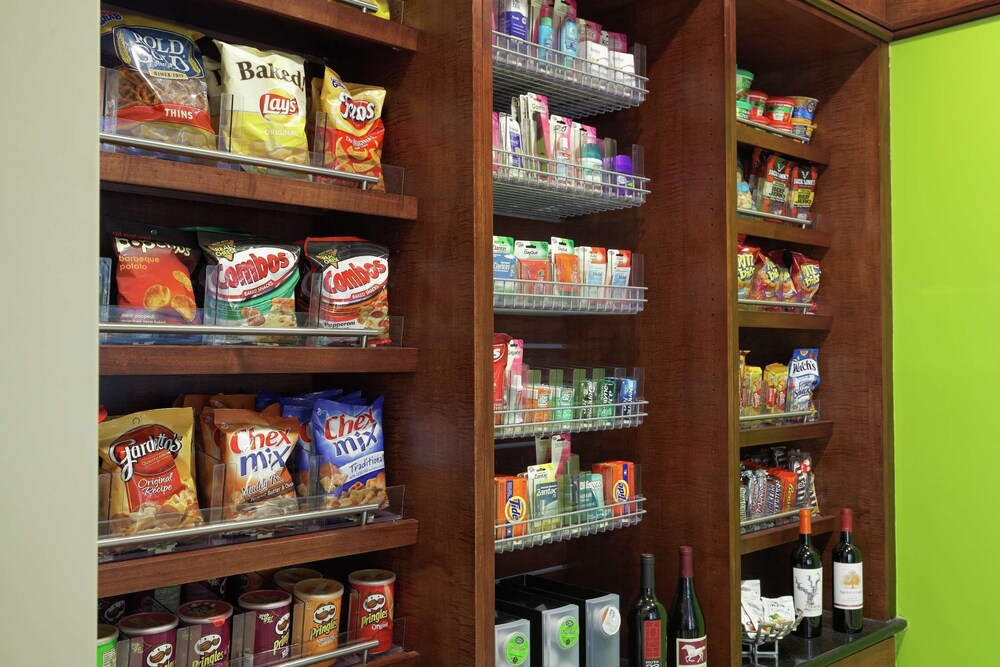 2 Connecting Suites with 3 beds and 1 sofabed at a Full Service Hotel by Suiteness