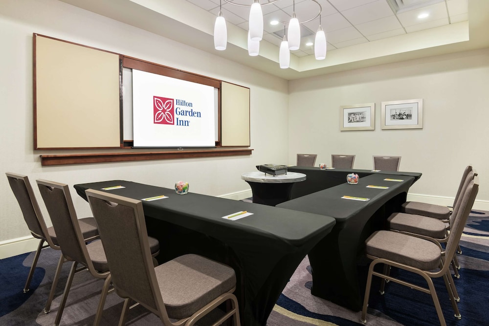 2 Connecting Suites with 3 beds and 1 sofabed at a Full Service Hotel by Suiteness