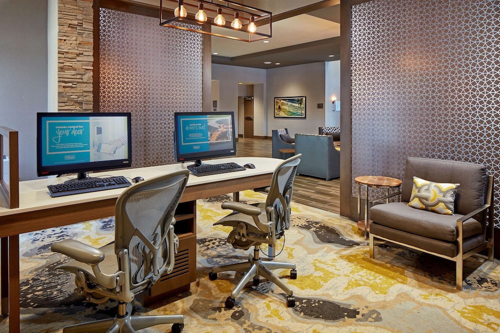 2 Connecting Suites with 3 beds and 2 sofabeds at a Full Service Hotel by Suiteness