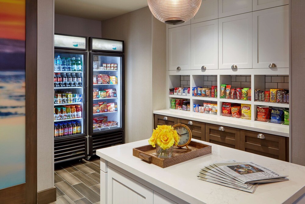 2 Connecting Suites with 3 beds and 2 sofabeds at a Full Service Hotel by Suiteness