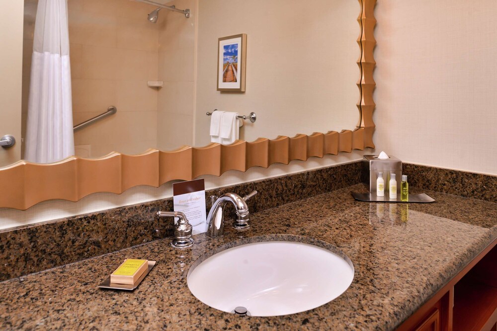 2 Connecting Suites with 3 beds and 1 sofabed at a Full Service Hotel by Suiteness