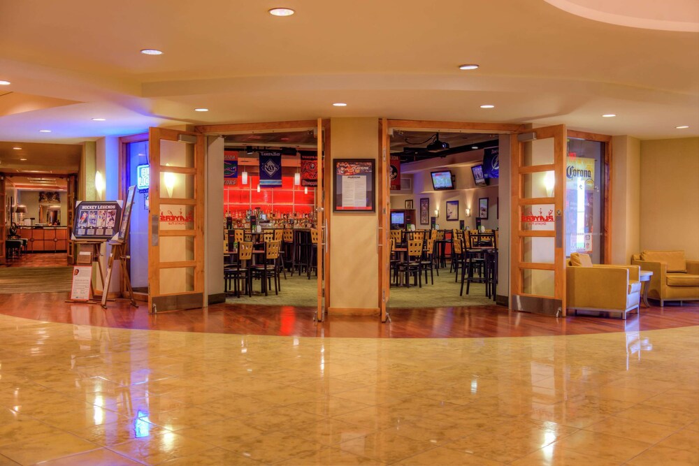 2 Connecting Suites with 3 beds and 1 sofabed at a Full Service Hotel by Suiteness