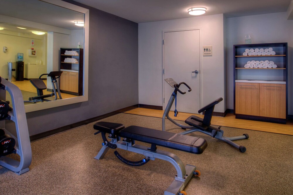 2 Connecting Suites with 3 beds and 1 sofabed at a Full Service Hotel by Suiteness