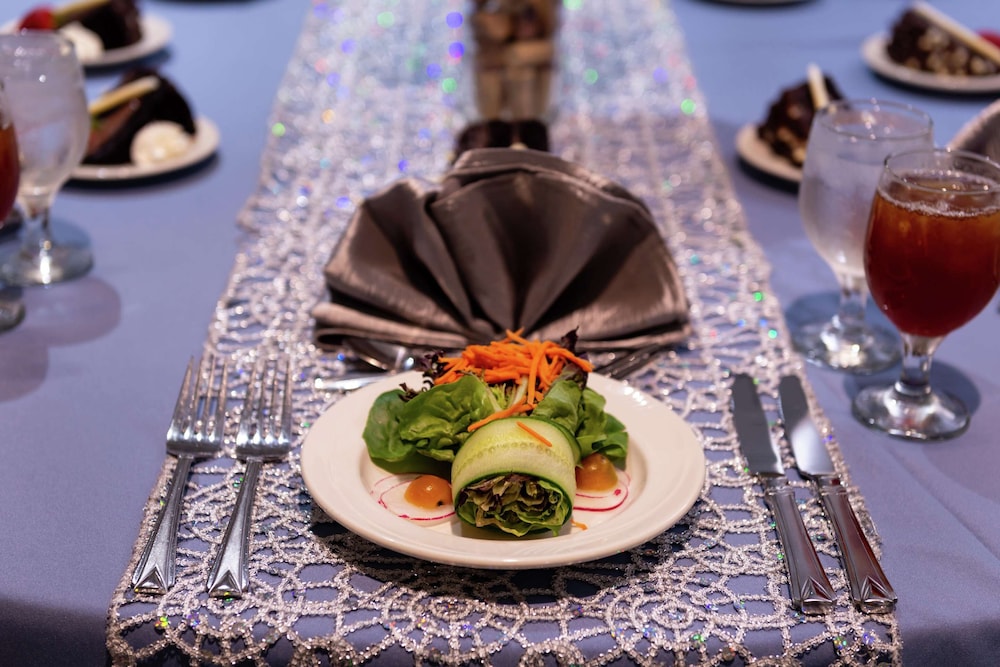 2 Connecting Suites with 3 beds and 1 sofabed at a Full Service Hotel by Suiteness