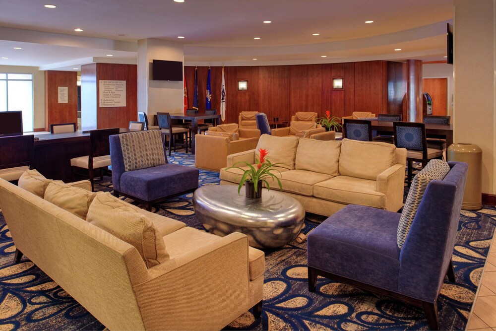 2 Connecting Suites with 3 beds and 1 sofabed at a Full Service Hotel by Suiteness
