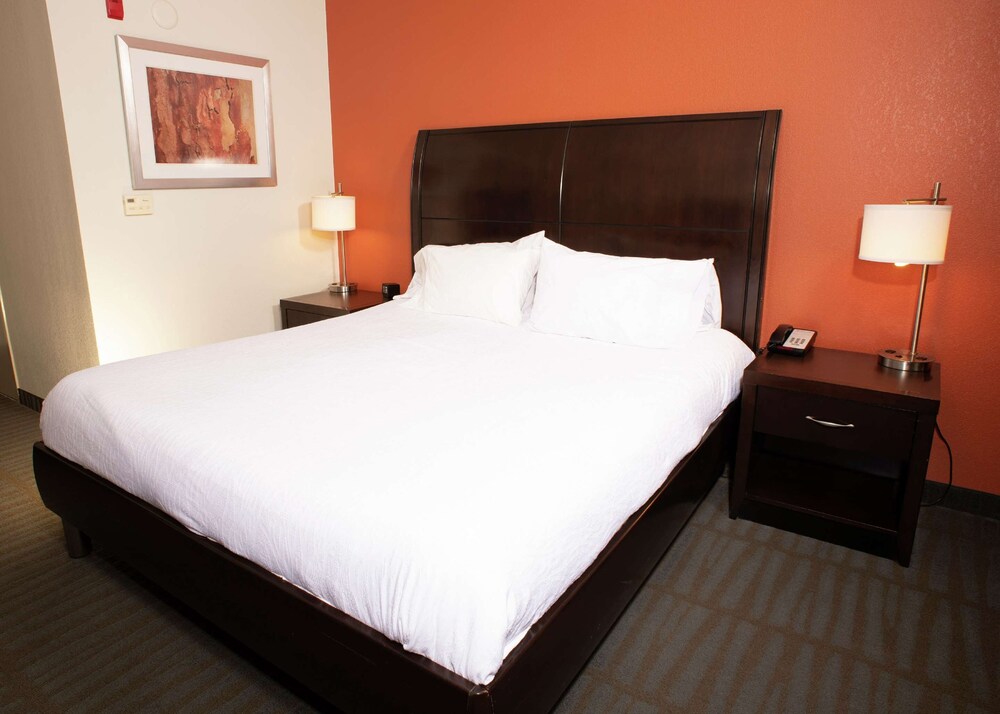 2 Connecting Suites with 2 beds and 2 sofabeds at a Full Service Hotel by Suiteness