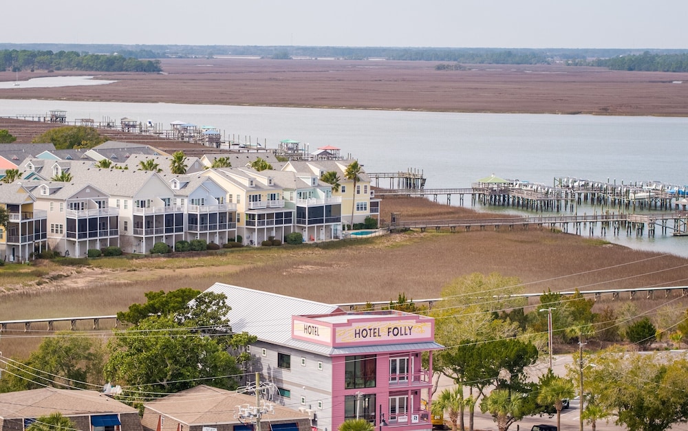 New boutique HOTEL FOLLY King Deluxe Studio 5 - cozy porch views of sunset over Folly River