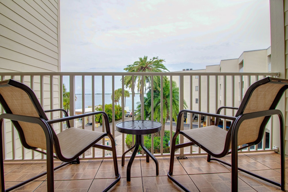 Waterfront condo with sunset views of Tampa Bay.
