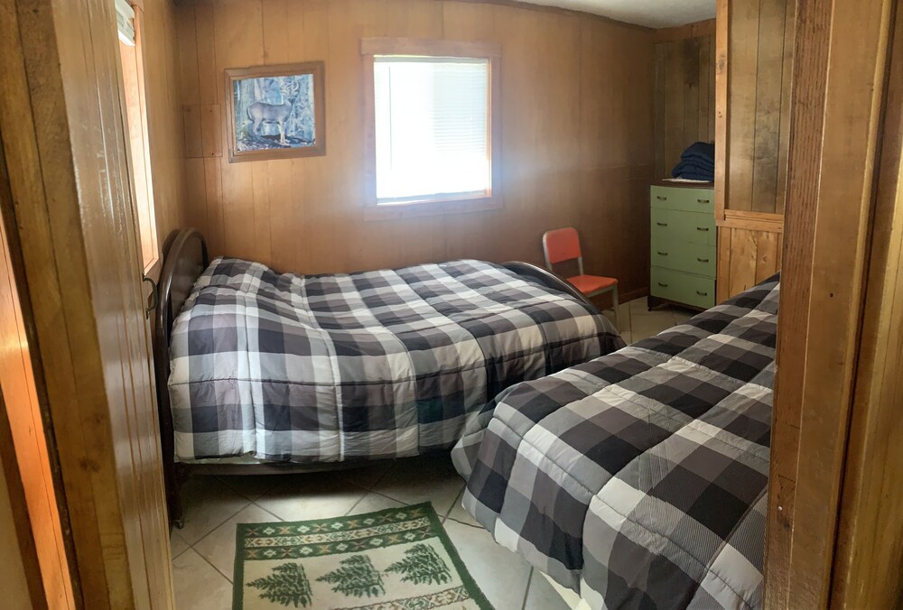 Sam’s Place (Cabin 3) on Long Lake, near shoreline. Own dock available