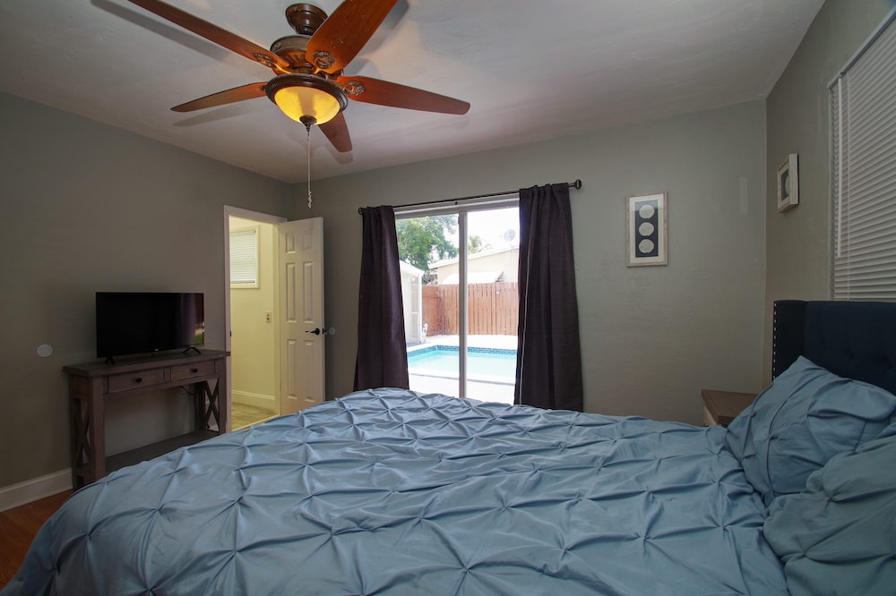 Cozy Home Minutes From the Beach with Relaxing grounds, Tiki Hut & Heated Pool!