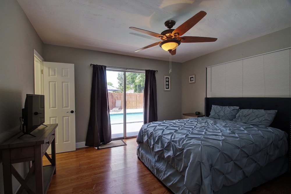 Cozy Home Minutes From the Beach with Relaxing grounds, Tiki Hut & Heated Pool!