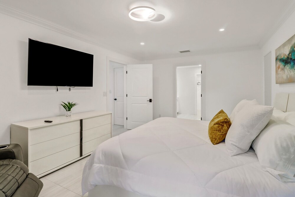 Stunning Naples home on 2 acres surrounded by beautiful palm trees and