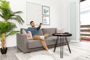 City Loft | Living area | 43-inch Smart TV with digital channels, TV