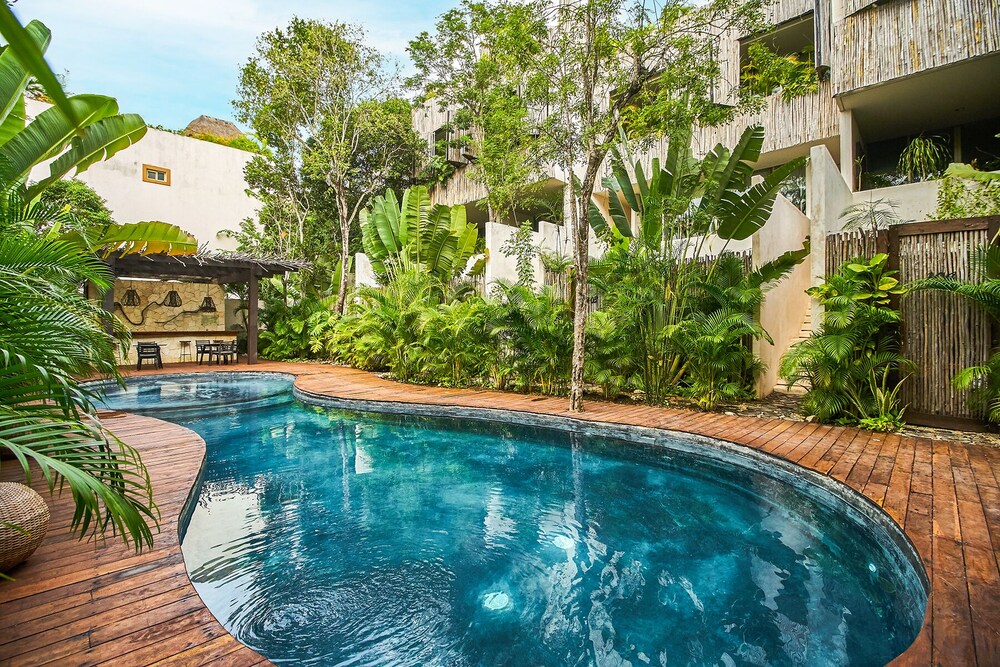 Image showcasing Eco-chic Design Condos Wrapped in Nature's Elements Reviews, Deals ...