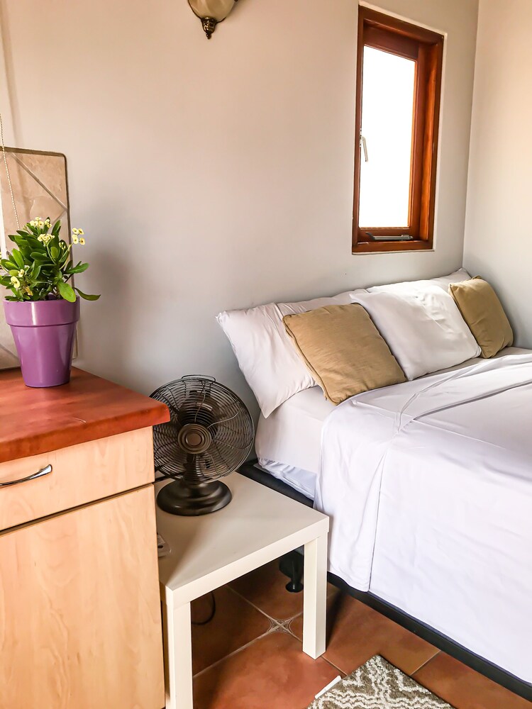 A little cottage in Aruba, tiny guesthouse w/ high vaulted ceilings