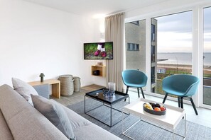 Superior Condo | Living area | 43-inch Smart TV with cable channels, TV