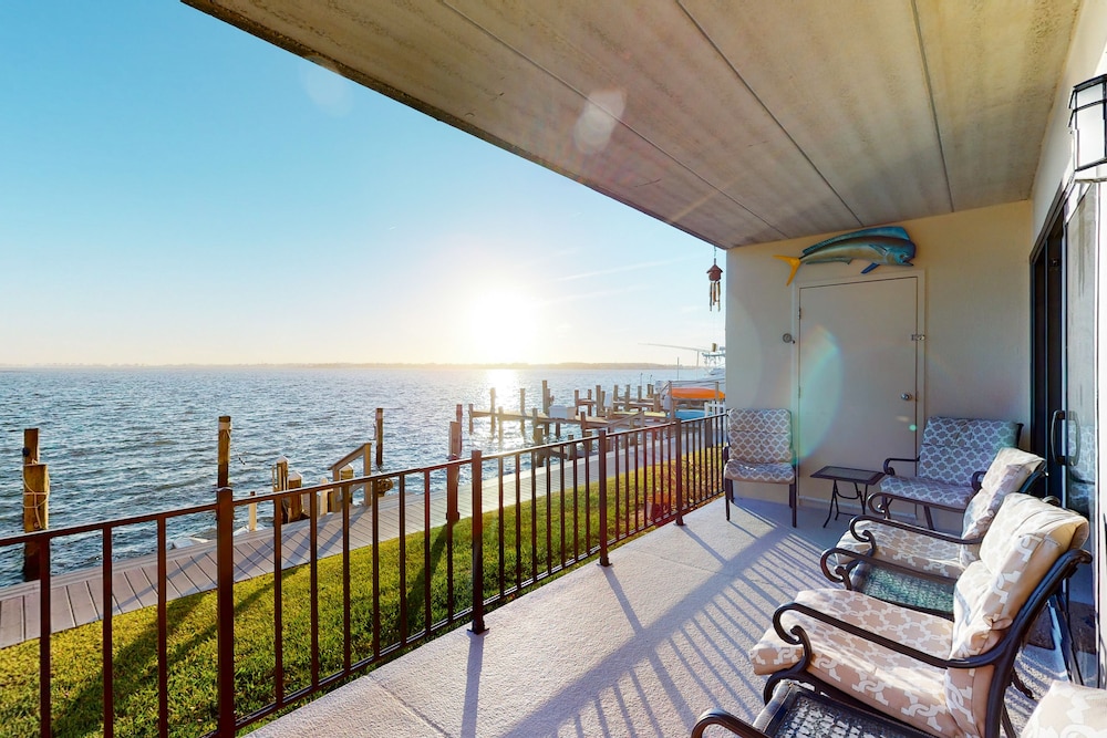 Bayfront Condo Steps from the Fishing Pier with Patio, WiFi, Central AC & W/D