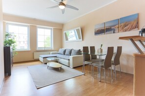 Standard Apartment | Living area | 40-inch flat-screen TV with cable channels, TV