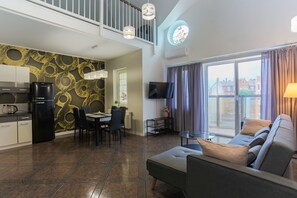 Family Apartment | Living area | 40-inch flat-screen TV with cable channels, TV