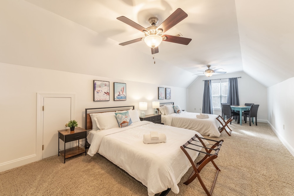 NEW LISTING! Lake Front 5 bedroom with Private Dock and Two Car Garage