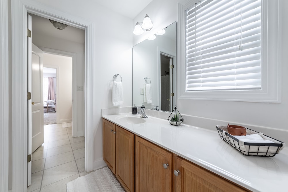 NEW LISTING! Lake Front 5 bedroom with Private Dock and Two Car Garage