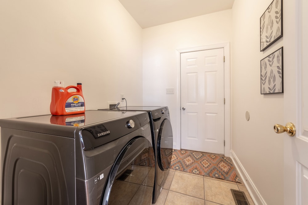 NEW LISTING! Lake Front 5 bedroom with Private Dock and Two Car Garage