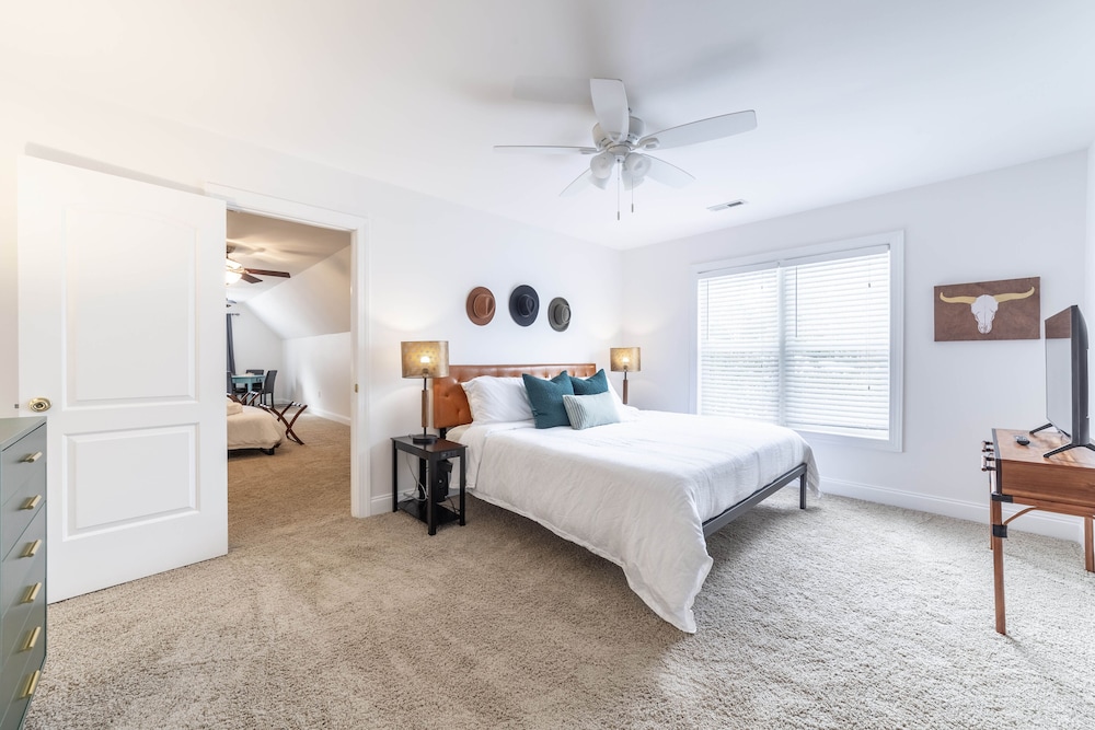 NEW LISTING! Lake Front 5 bedroom with Private Dock and Two Car Garage