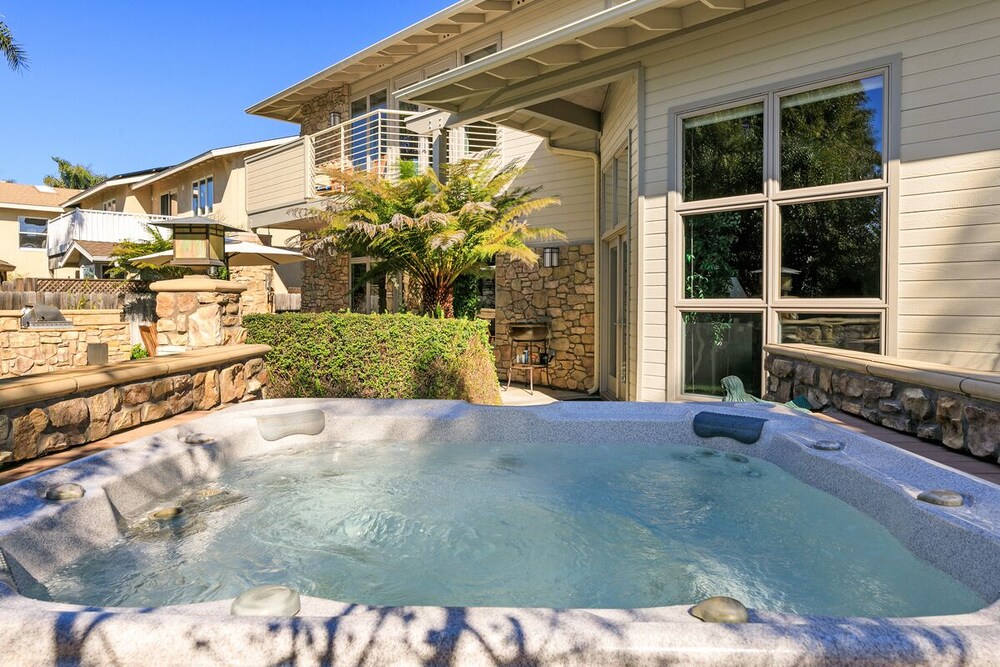 Escape to luxurious custom resort-style home in Olde Carlsbad!