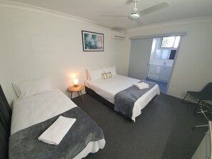 Twin Room | Laptop workspace, blackout drapes, iron/ironing board, bed sheets