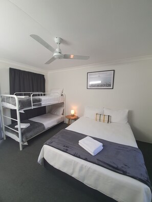 Quadruple Room | Laptop workspace, blackout drapes, iron/ironing board, bed sheets
