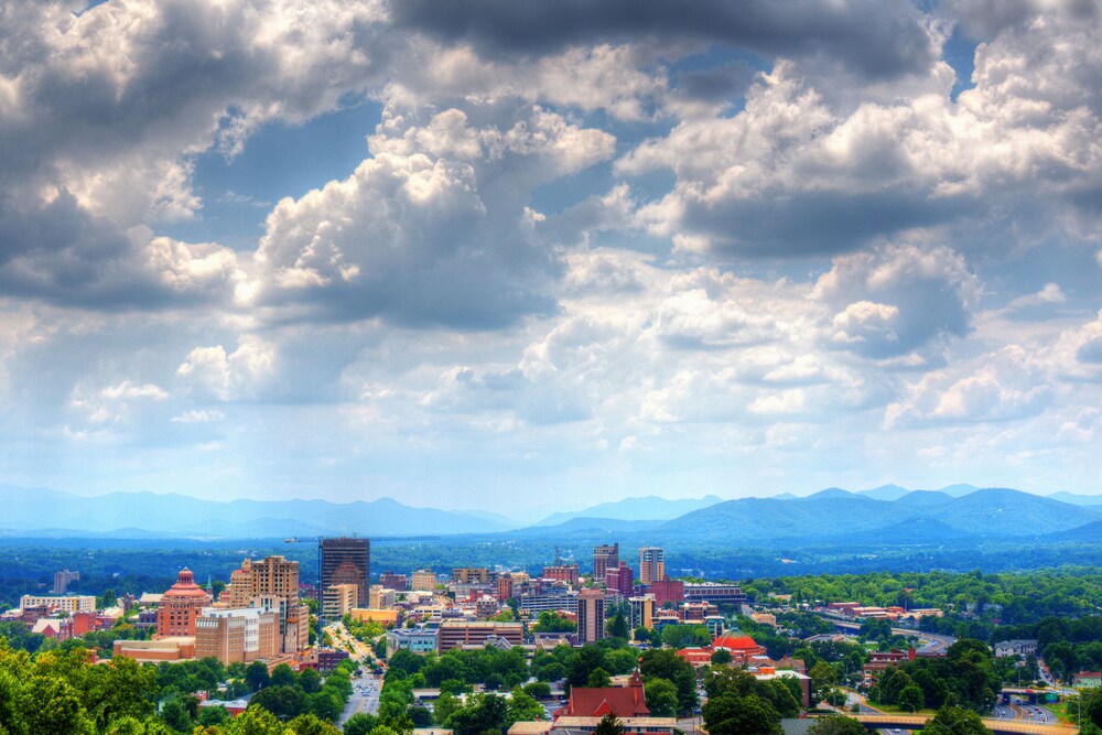 Skylight Condo with City & Mountain Views, Luxury Interior & Walkable Locale