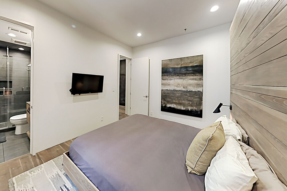 Skylight Condo with City & Mountain Views, Luxury Interior & Walkable Locale