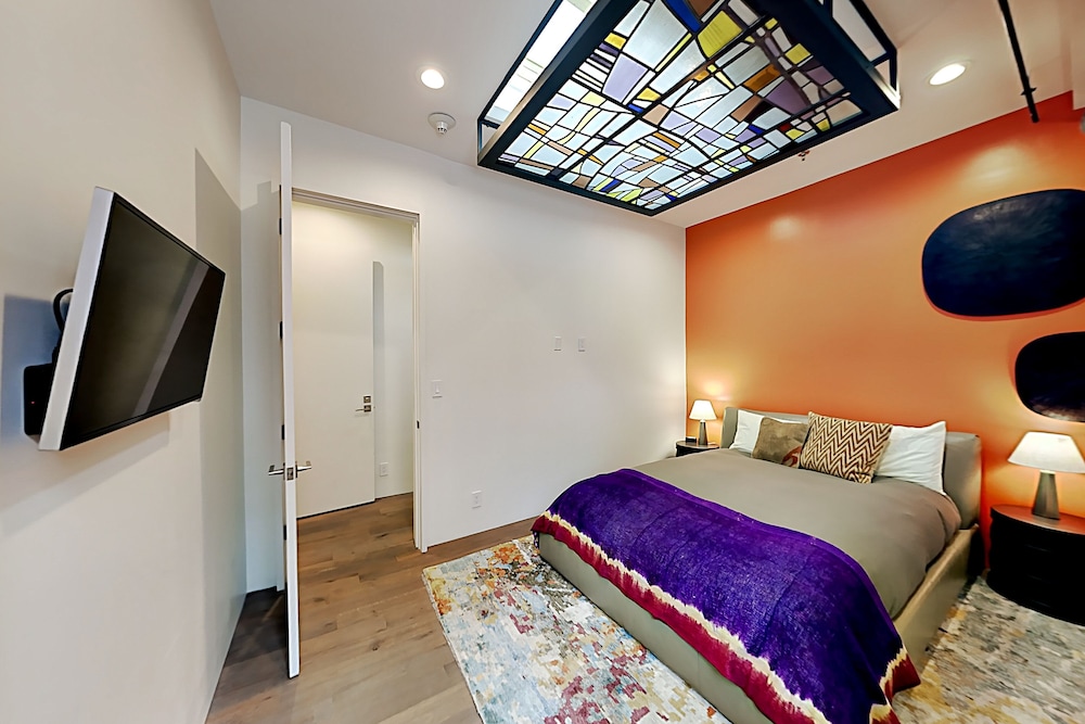 Skylight Condo with City & Mountain Views, Luxury Interior & Walkable Locale