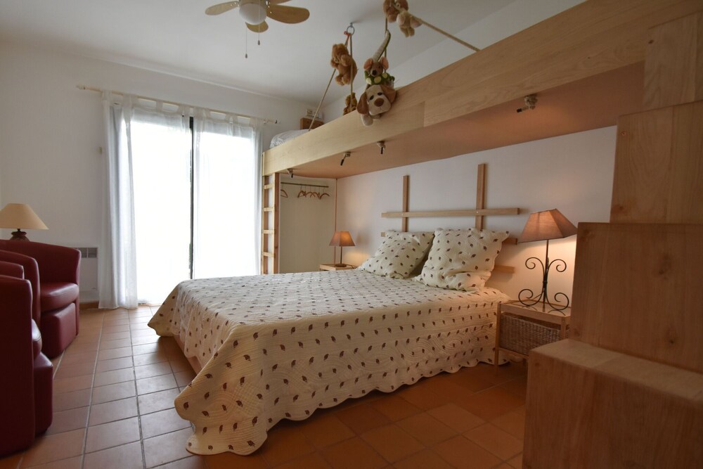 Spacious villa with heated pool with super slide between the beach and