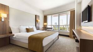 Luxe beddengoed, een minibar, een kluis op de kamer, een laptopwerkplek