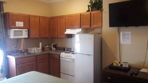 Mini-fridge, microwave, oven, hob