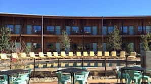 Outdoor pool, open 9:00 AM to 9:00 PM, pool umbrellas, sun loungers