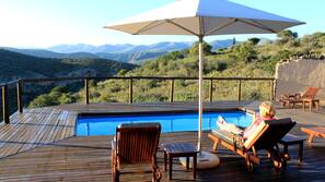 Outdoor pool, pool umbrellas, pool loungers