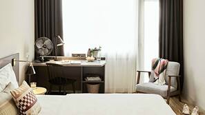 Hypo-allergenic bedding, desk, laptop workspace, iron/ironing board