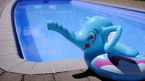 Outdoor pool, pool umbrellas, pool loungers