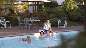 Outdoor pool, pool umbrellas, pool loungers