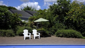 Outdoor pool, pool umbrellas, pool loungers