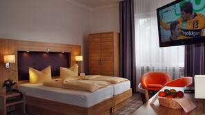 Hypoallergeen beddengoed, een kluis op de kamer, een bureau
