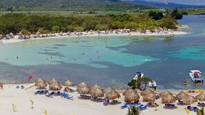Private beach nearby, white sand, sun loungers, beach umbrellas